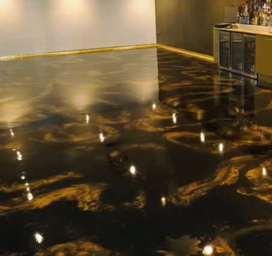 Metallic resin floor installation by Trusty Tread